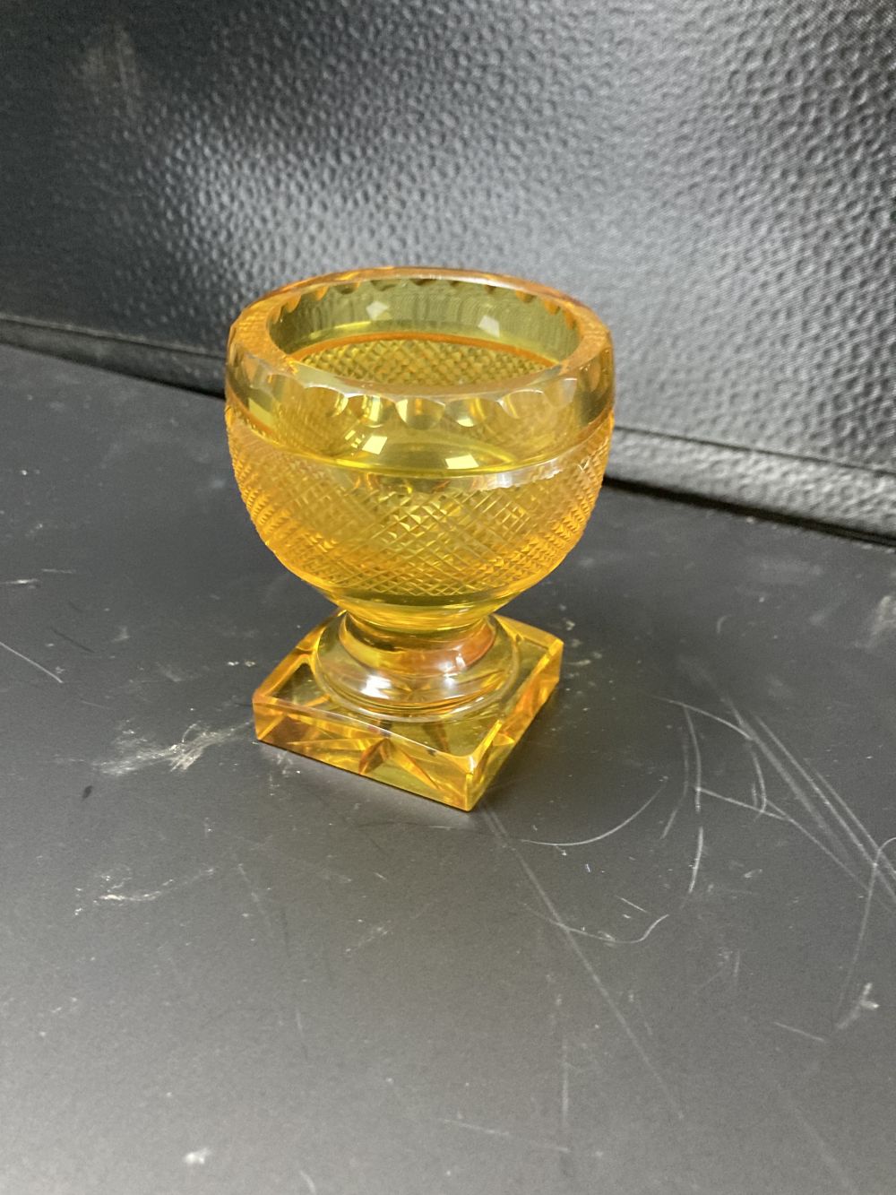 Four items of cut amber glass, 19th / 20th century,